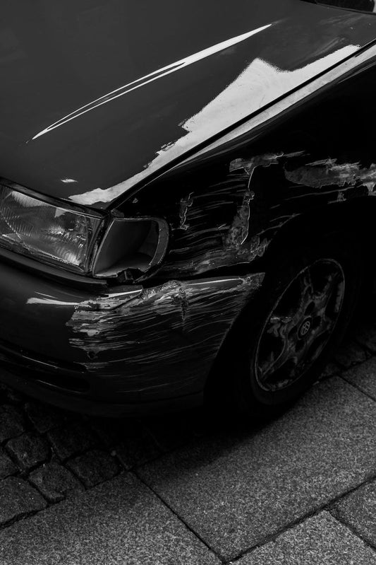 Scratched car fender before touch-up paint repair
